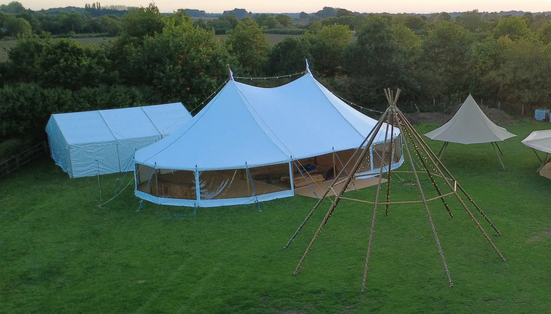 Sailcloth marquee set for summer wedding